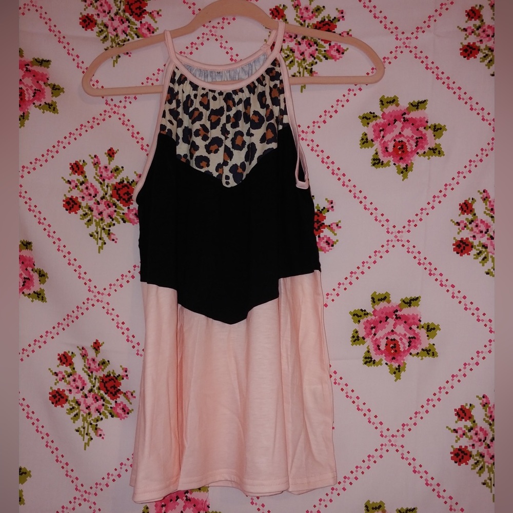 Size Medium tank top. Pink black cheetah print color block